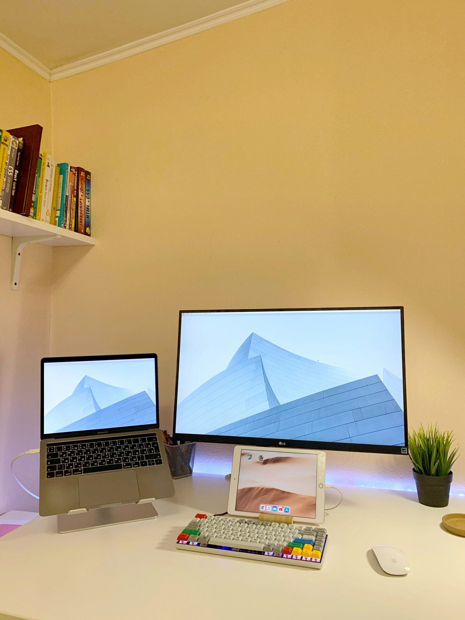 macbook pro on white table